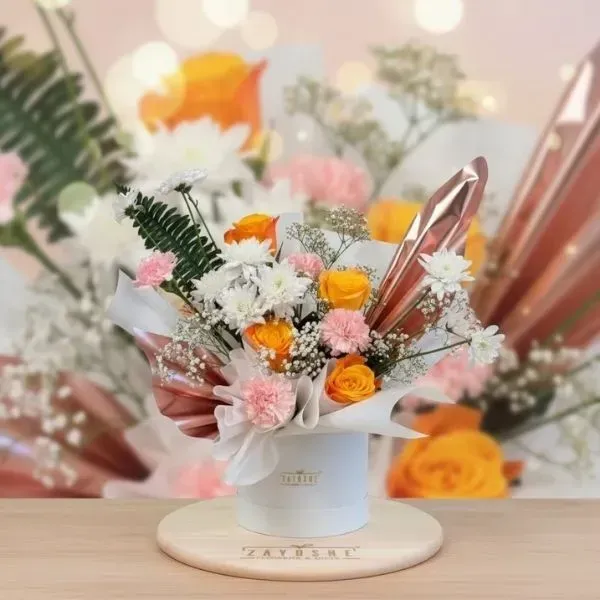 5(600 x 600 px) Radiant Sunrise Blossom Bouquet