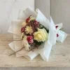 Cream White Rose Bouquet 3 Elegant cream white rose bouquet with red carnations wrapped in crisp white paper