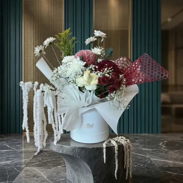 Luxury Mixed Flower Box – Elegant White Hat Box Bouquet 3 Luxury mixed flower box with white roses, burgundy mums, pink disbud chrysanthemums, and hanging amaranthus in a white hat box