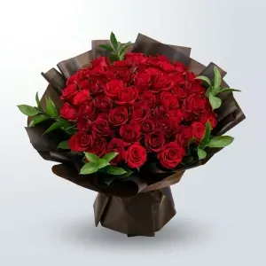 Luxury Red Rose Bouquet – Hand-Tied Fresh Roses in Black Wrapping 1 Luxury red rose bouquet wrapped in translucent dark brown and black paper with fresh green foliage